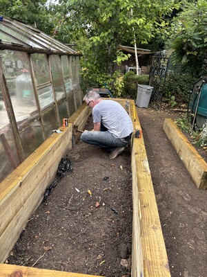 Community volunteering: Dan fixing the inside