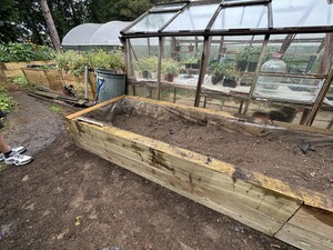 Community volunteering: planter and greenhouse